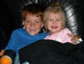 Big Brother cuddles Little Sister