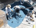 Spraying raw plaster