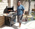 Uncle Barney BBQ'ing salmon skewers